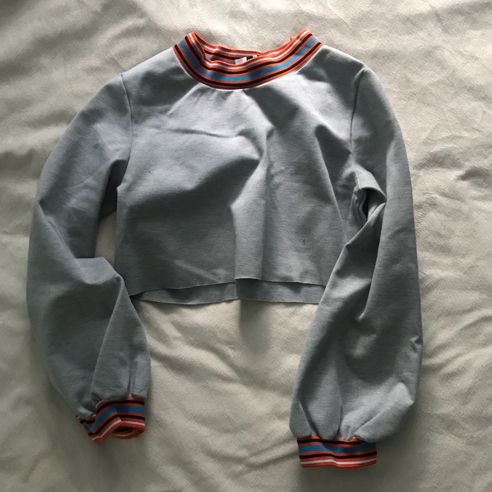 Raw edge cropped crewneck with sporty stripe cuffs